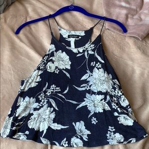 blue tank top with white floral print